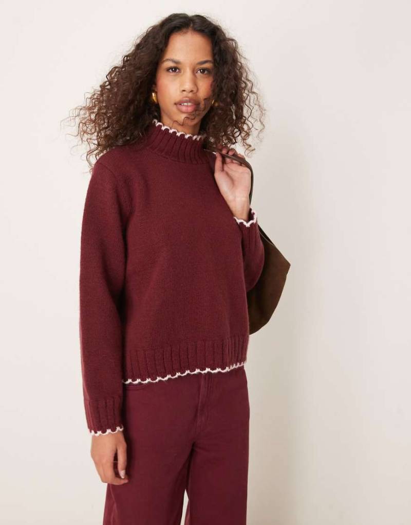 ASOS DESIGN - Hochgeschlossener Pullover in Burgunderrot mit Langettenstich von ASOS DESIGN