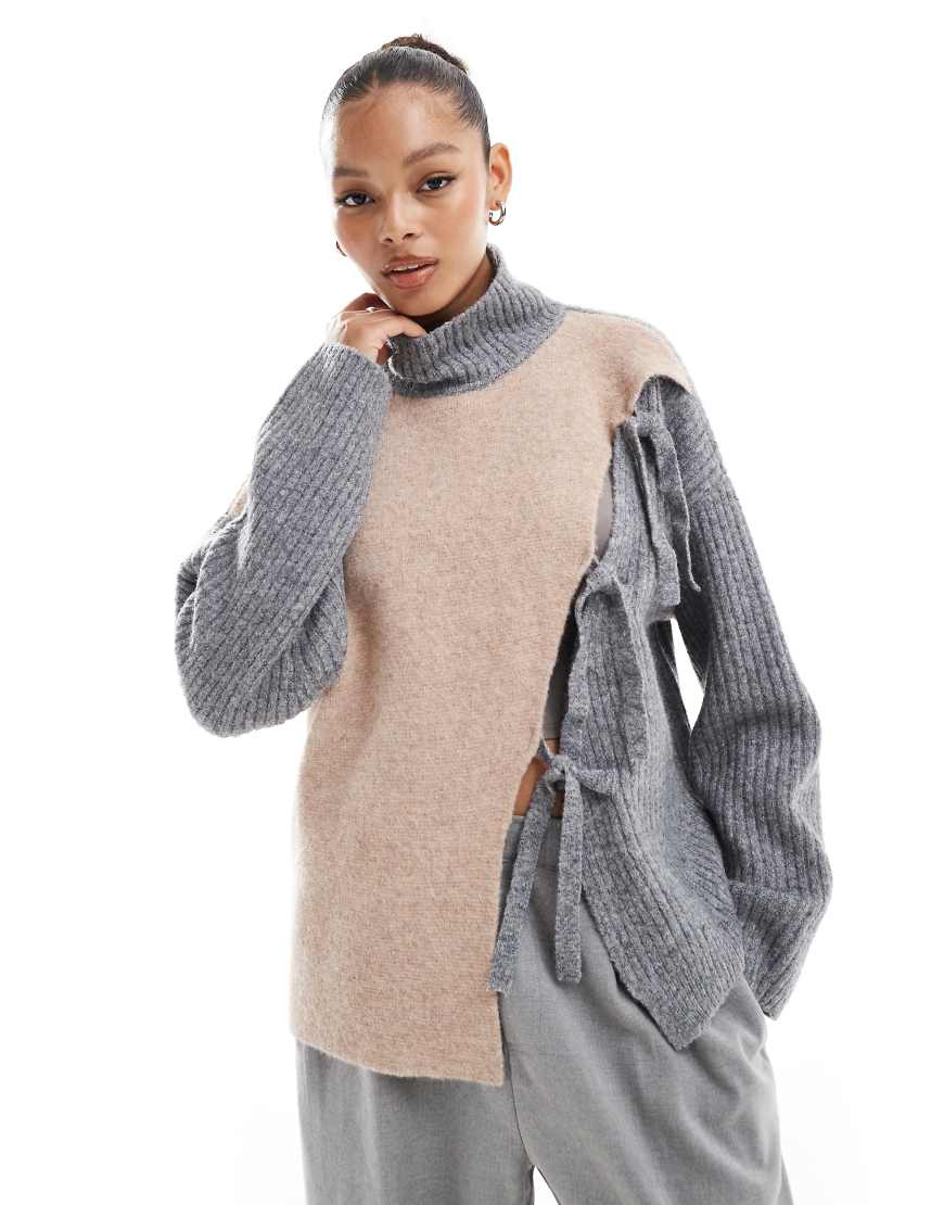 ASOS DESIGN - Hochgeschlossener Pullover in neutralem Blockfarbendesign mit Schnürdetail ASOS DESIGN - Hochgeschlossener Pullover in neutralem Blockfarbendesign mit Schnürdetail von ASOS DESIGN