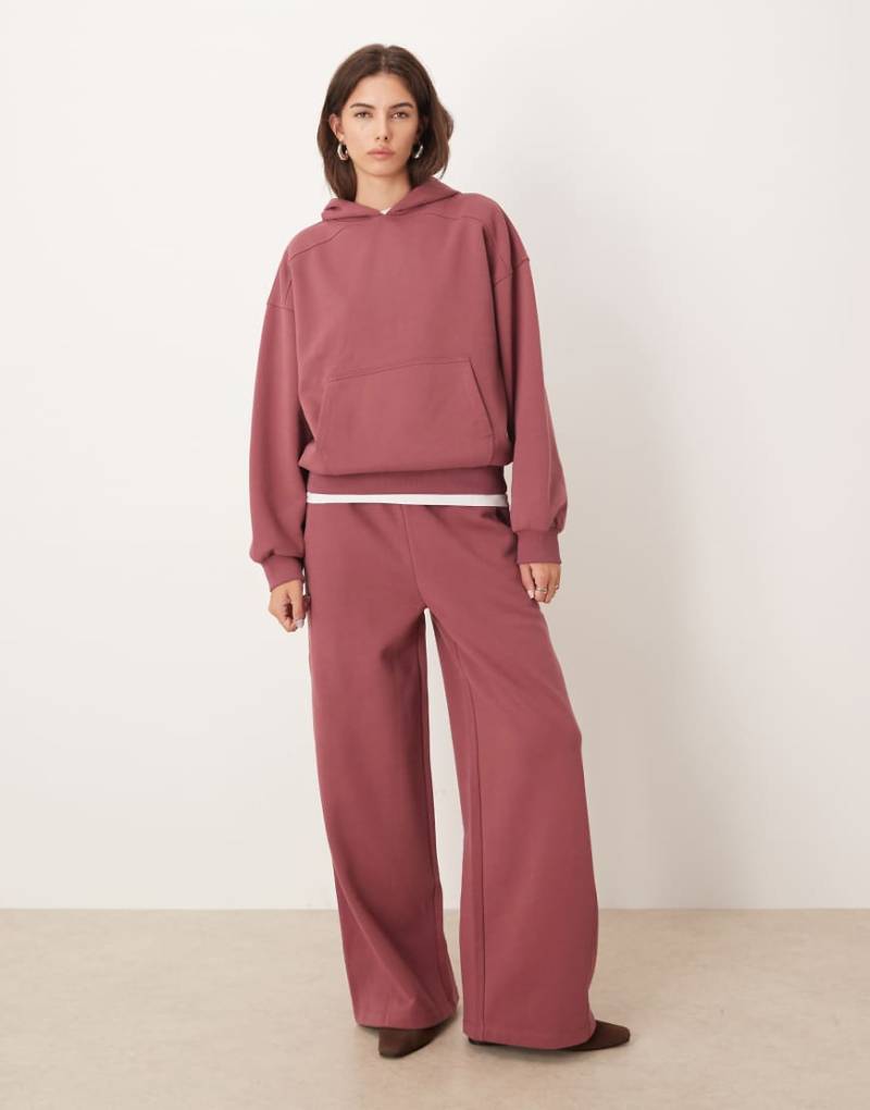 ASOS DESIGN - Hochwertige, schwere Jogginghose in Dunkelrosa mit Ziernähten und weitem Bein, 500 g/m²-Lila von ASOS DESIGN