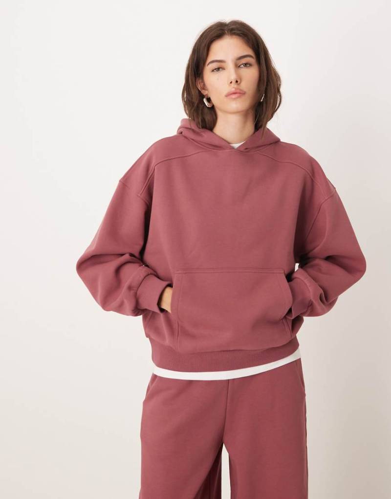 ASOS DESIGN - Hochwertiger, schwerer Kapuzenpullover in Dunkelrosa mit Ballonärmeln, 500 g/m²-Lila ASOS DESIGN - Hochwertiger, schwerer Kapuzenpullover in Dunkelrosa mit Ballonärmeln, 500 g/m²-Lila von ASOS DESIGN