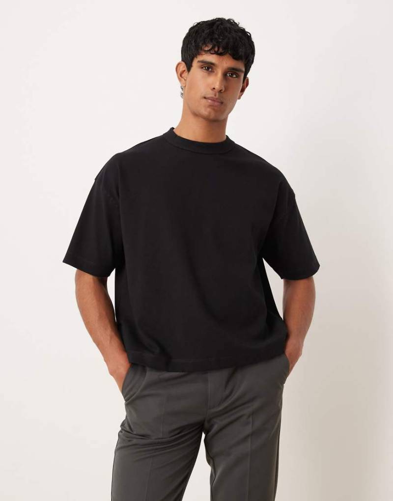 ASOS DESIGN - Hochwertiges, kastiges Oversize-T-Shirt aus Interlock-Jersey in Schwarz von ASOS DESIGN