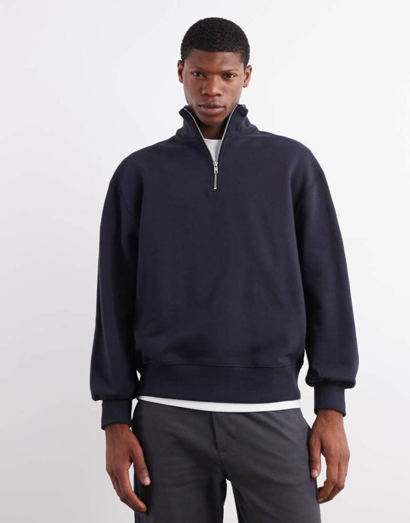 ASOS DESIGN - Hochwertiges Oversize-Sweatshirt aus schwerem Stoff in Marineblau mit kurzem Reißverschluss, 400 g/m² von ASOS DESIGN