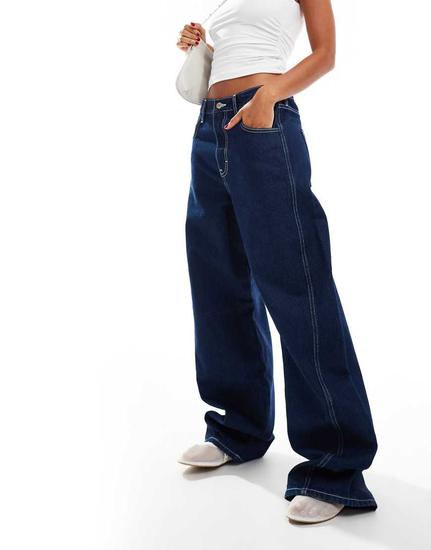 ASOS DESIGN - Horeshore - Jeans in Indigoblau mit abgerundetem Beinschnitt ASOS DESIGN - Horeshore - Jeans in Indigoblau mit abgerundetem Beinschnitt von ASOS DESIGN