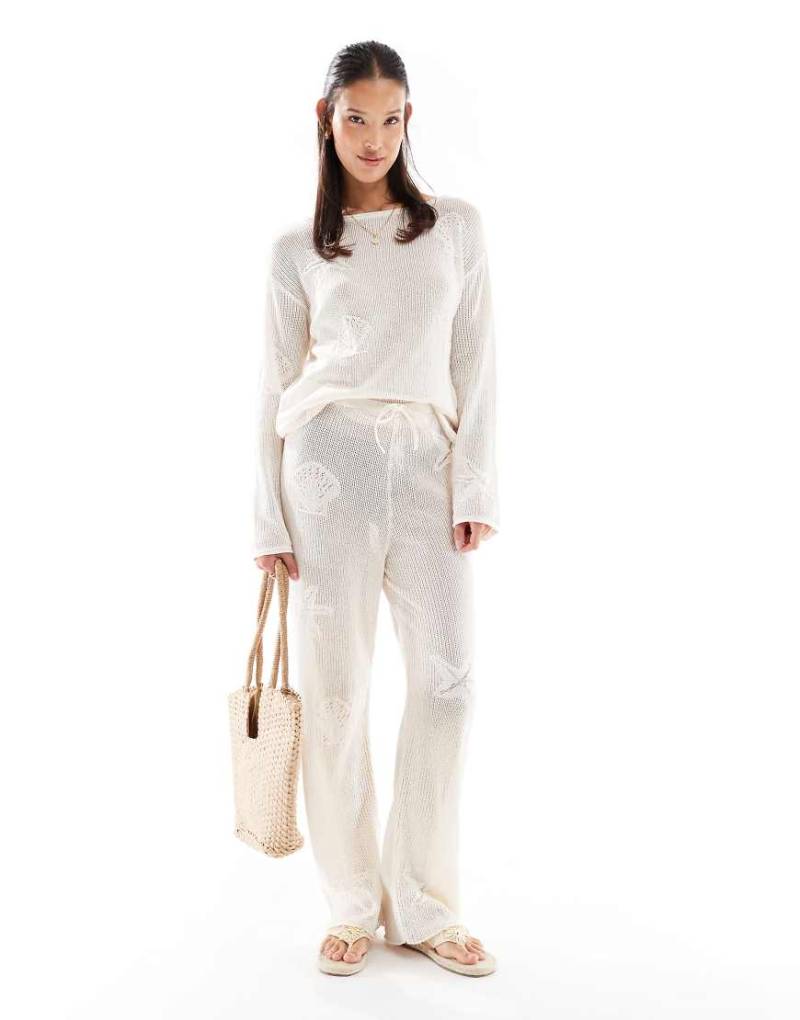 ASOS DESIGN - Hose aus Spitzen-Strick in Ecru mit weitem Bein und Muschelmotiven-Weiß von ASOS DESIGN