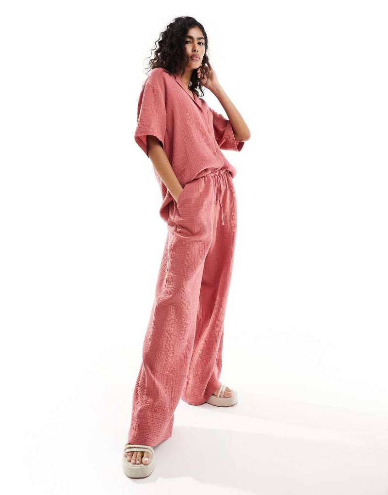 ASOS DESIGN - Hose aus grob gewebter Baumwolle in Terrakotta mit Bindegürtel-Orange von ASOS DESIGN