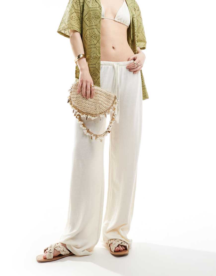 ASOS DESIGN - Hose in Leinenoptik in Creme mit niedrigem Bund-Weiß ASOS DESIGN - Hose in Leinenoptik in Creme mit niedrigem Bund-Weiß von ASOS DESIGN