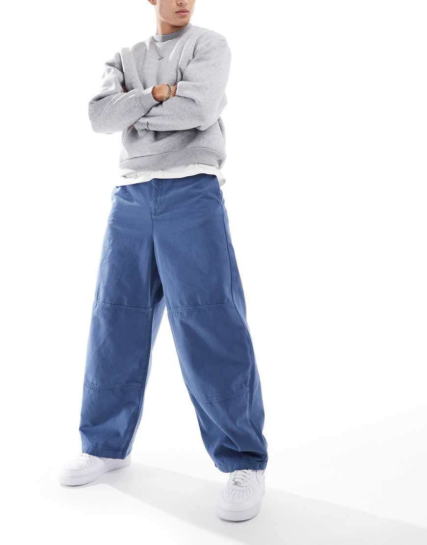ASOS DESIGN - Hose in verwaschenem Blau mit abgerundetem Beinschnitt ASOS DESIGN - Hose in verwaschenem Blau mit abgerundetem Beinschnitt von ASOS DESIGN