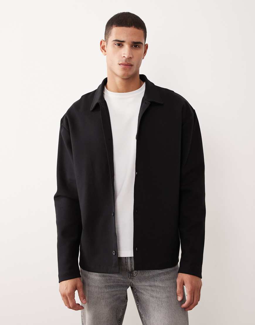 ASOS DESIGN - Jacke aus Jersey in Schwarz mit Knopfleiste und lockerem Schnitt ASOS DESIGN - Jacke aus Jersey in Schwarz mit Knopfleiste und lockerem Schnitt von ASOS DESIGN