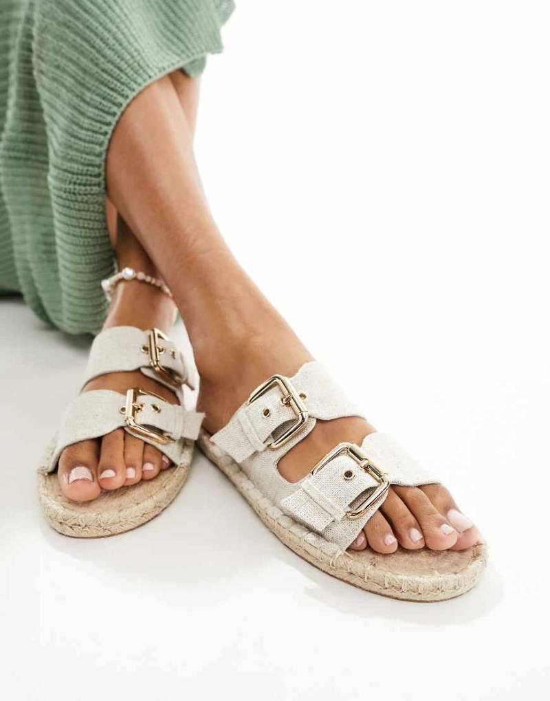 ASOS DESIGN - Jada - Espadrilles-Mules aus naturfarbenem Leinen mit zwei Schnallen-Neutral ASOS DESIGN - Jada - Espadrilles-Mules aus naturfarbenem Leinen mit zwei Schnallen-Neutral von ASOS DESIGN