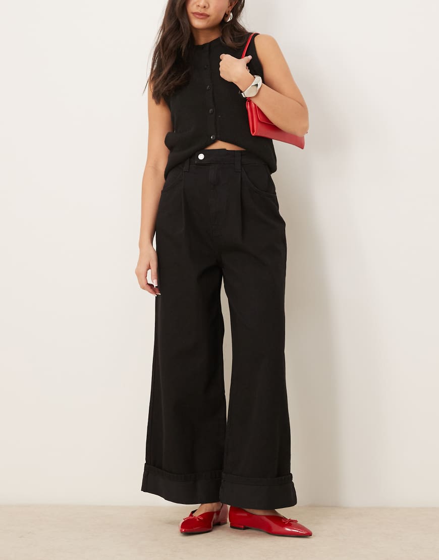 ASOS DESIGN - Jeans in Schwarz mit extrem weitem Bein und Umschlag von ASOS DESIGN