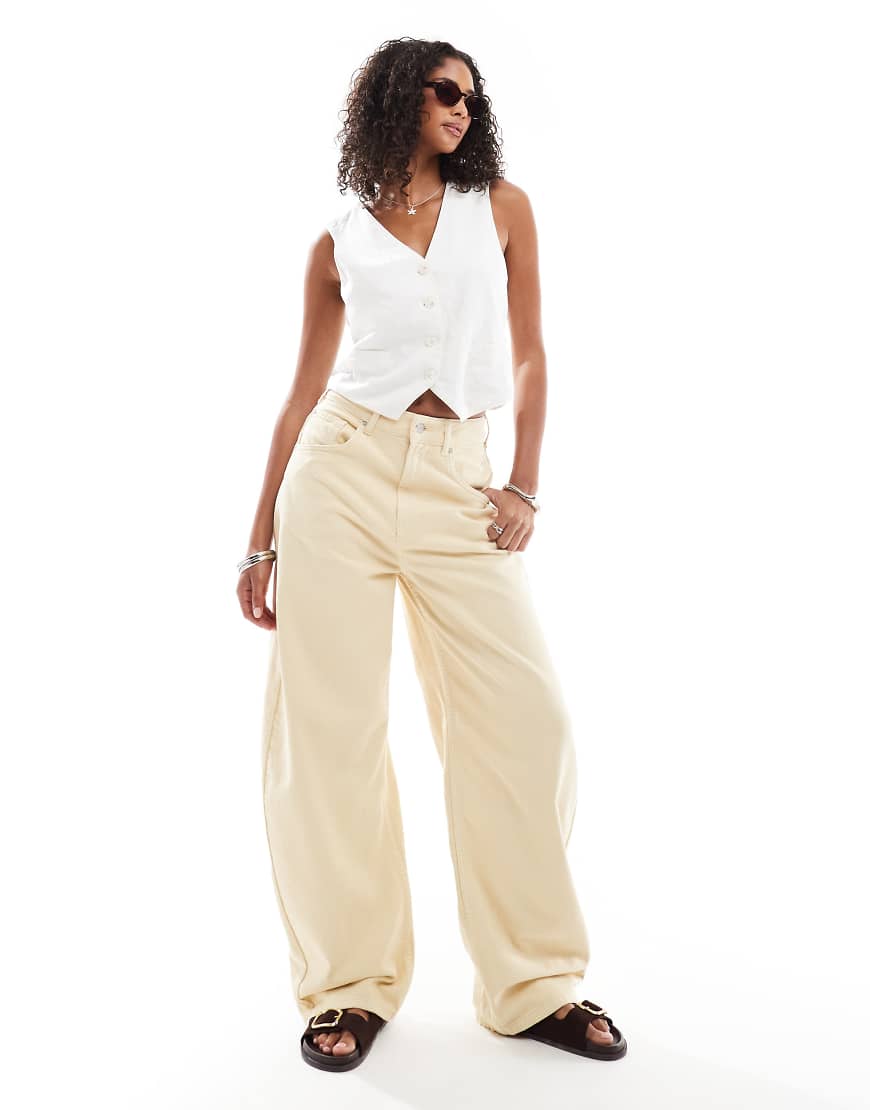 ASOS DESIGN - Jeans in Zitronengelb mit hohem Bund und weitem, abgerundetem Bein ASOS DESIGN - Jeans in Zitronengelb mit hohem Bund und weitem, abgerundetem Bein von ASOS DESIGN