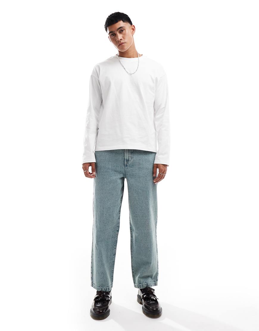 ASOS DESIGN - Jeans in mittlerer Stone-Waschung mit weiter Passform-Blau ASOS DESIGN - Jeans in mittlerer Stone-Waschung mit weiter Passform-Blau von ASOS DESIGN