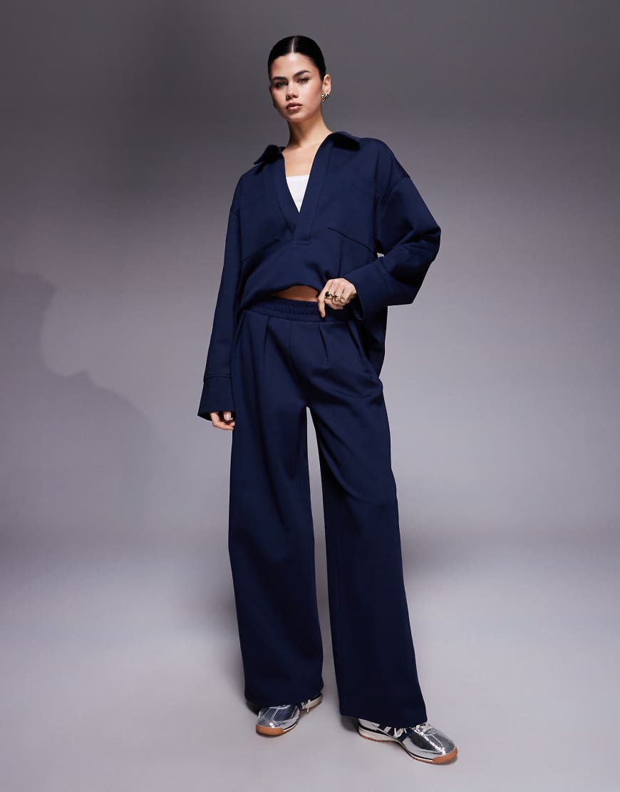 ASOS DESIGN - Jogginghose aus Interlock-Stoff in Marineblau mit weitem Bein, Kombiteil von ASOS DESIGN