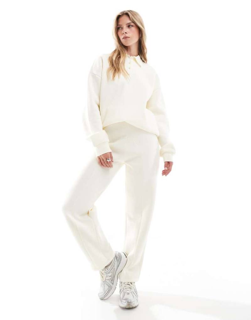 ASOS DESIGN - Jogginghose in Buttermilchgelb mit Ziernaht von ASOS DESIGN