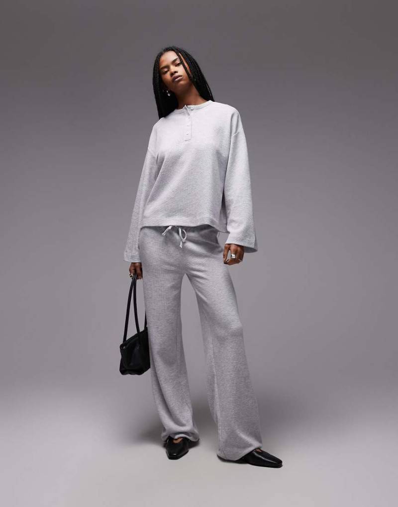 ASOS DESIGN - Jogginghose in Eisgrau meliert mit Waffelstruktur und weitem Bein, Kombiteil ASOS DESIGN - Jogginghose in Eisgrau meliert mit Waffelstruktur und weitem Bein, Kombiteil von ASOS DESIGN