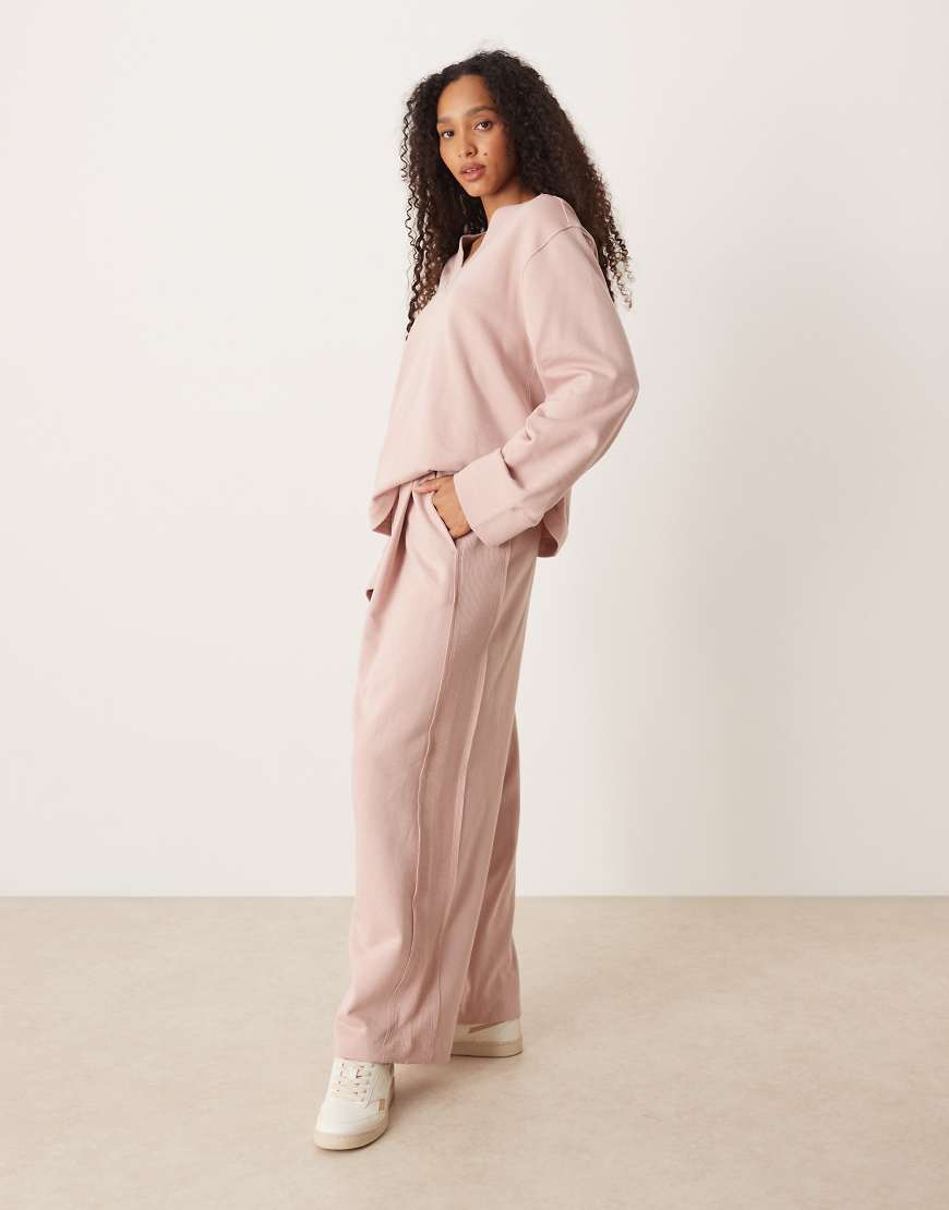 ASOS DESIGN - Jogginghose in Rosa mit weitem Bein und Waffelstruktur-Einsatz, Kombiteil ASOS DESIGN - Jogginghose in Rosa mit weitem Bein und Waffelstruktur-Einsatz, Kombiteil von ASOS DESIGN