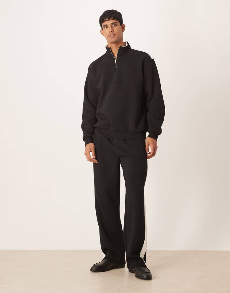 ASOS DESIGN - Jogginghose in Schwarz mit weitem Bein und Einsätzen in Patchwork-Optik, Kombiteil-Marineblau von ASOS DESIGN