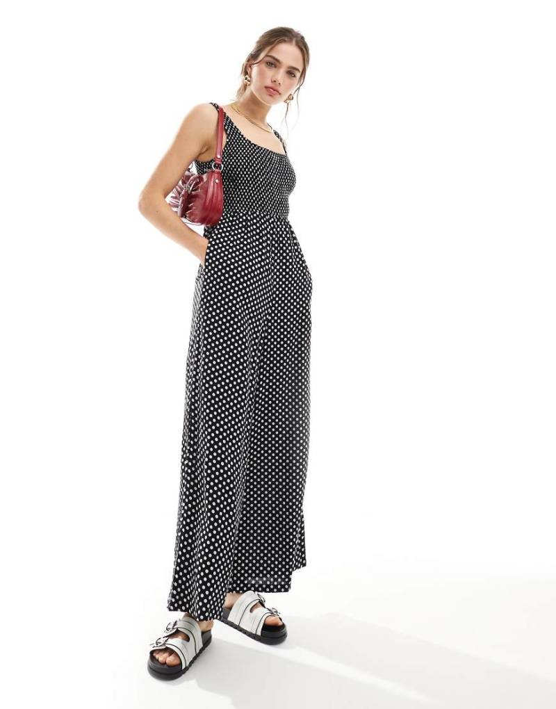 ASOS DESIGN - Jumpsuit in Schwarz-Weiß gepunktet mit U-Boot-Ausschnitt und weitem Bein-Bunt von ASOS DESIGN