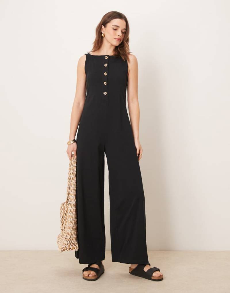 ASOS DESIGN - Jumpsuit in Schwarz mit Knopfleiste von ASOS DESIGN