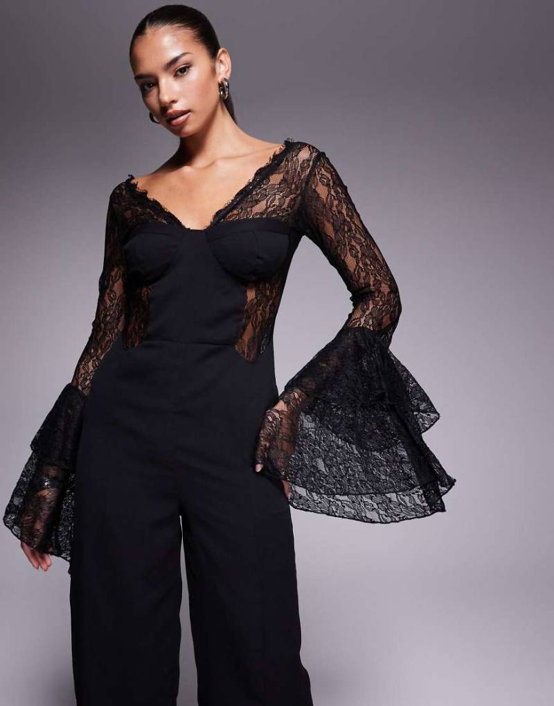 ASOS DESIGN - Jumpsuit in Schwarz mit Korsettdetail, Spitze und Rüschen von ASOS DESIGN