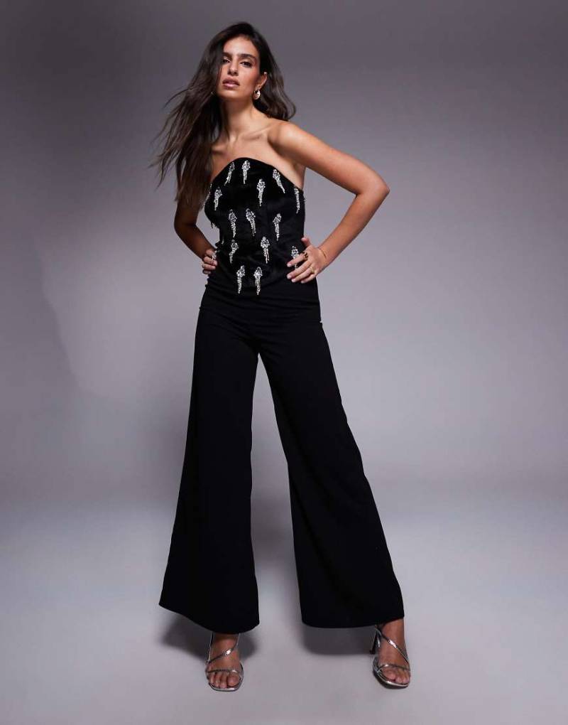 ASOS DESIGN - Jumpsuit in Schwarz mit verziertem Korsettoberteil und schmal geschnittener Hose von ASOS DESIGN