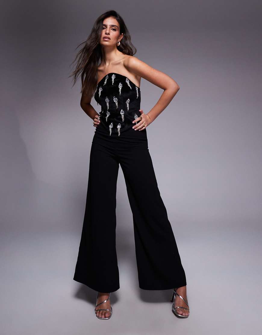 ASOS DESIGN - Jumpsuit in Schwarz mit verziertem Korsettoberteil und schmal geschnittener Hose von ASOS DESIGN