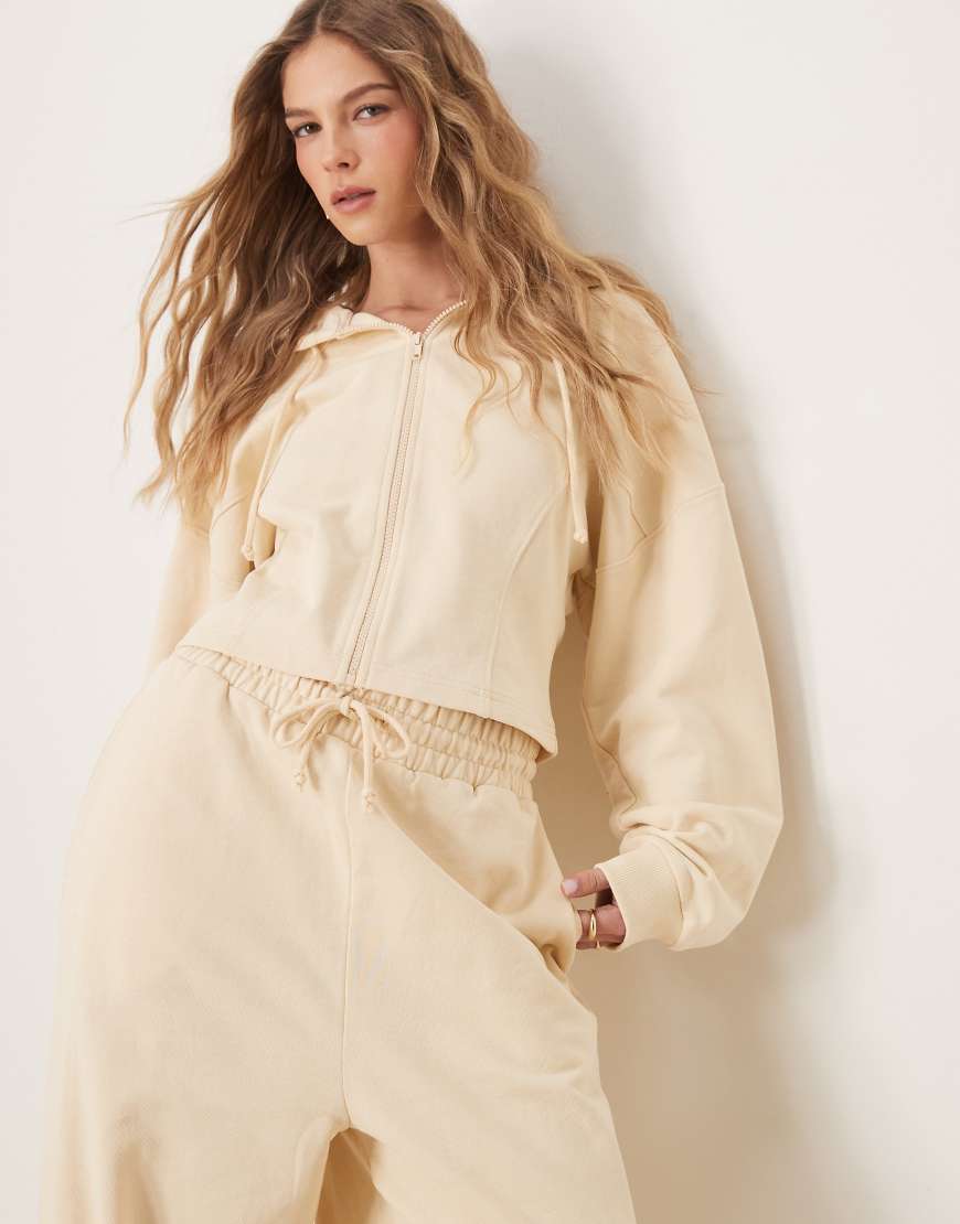 ASOS DESIGN - Kapuzenjacke in Buttermilchgelb mit Reißverschluss und Nahtdetail, Kombiteil ASOS DESIGN - Kapuzenjacke in Buttermilchgelb mit Reißverschluss und Nahtdetail, Kombiteil von ASOS DESIGN