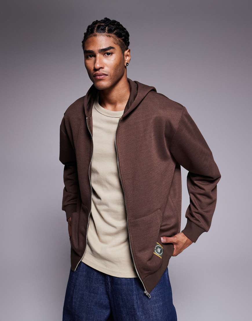 ASOS DESIGN - Kapuzenjacke mit Waffelstruktur und durchgehendem Reißverschluss in Braun-Brown von ASOS DESIGN