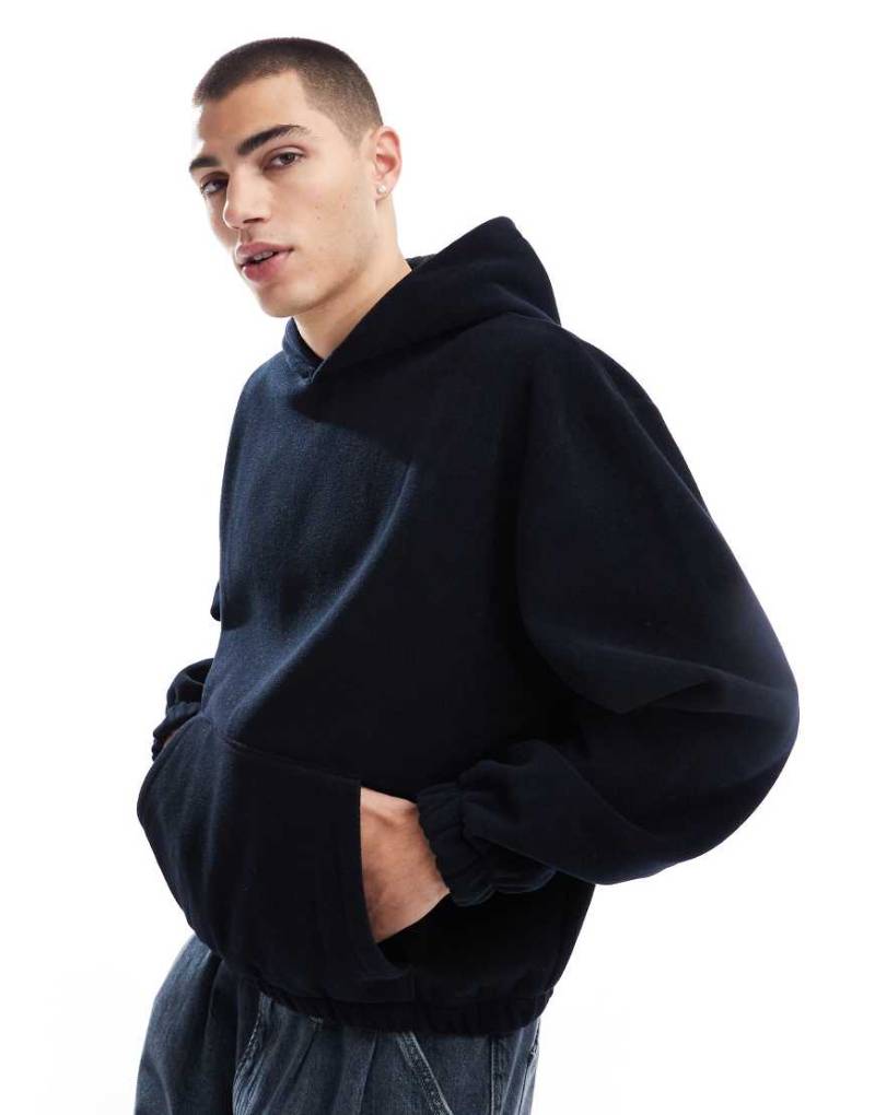 ASOS DESIGN - Kapuzenpullover aus Fleece in Marineblau mit kastigem Oversize-Schnitt von ASOS DESIGN