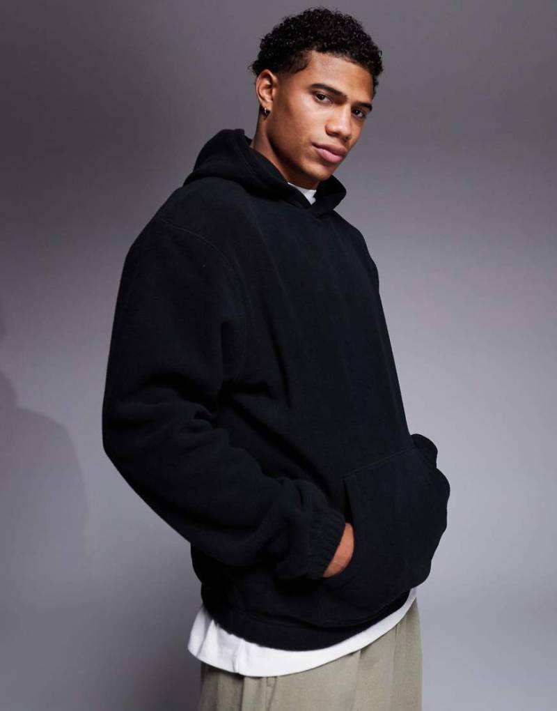 ASOS DESIGN - Kapuzenpullover aus Polarfleece in Schwarz von ASOS DESIGN