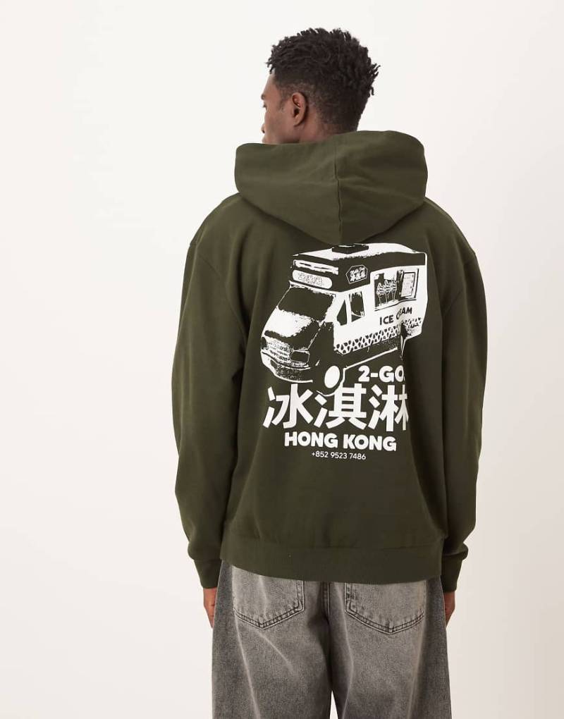 ASOS DESIGN - Kapuzenpullover in Anthrazit mit Souvenir-Van-Rückenprint-Grün von ASOS DESIGN