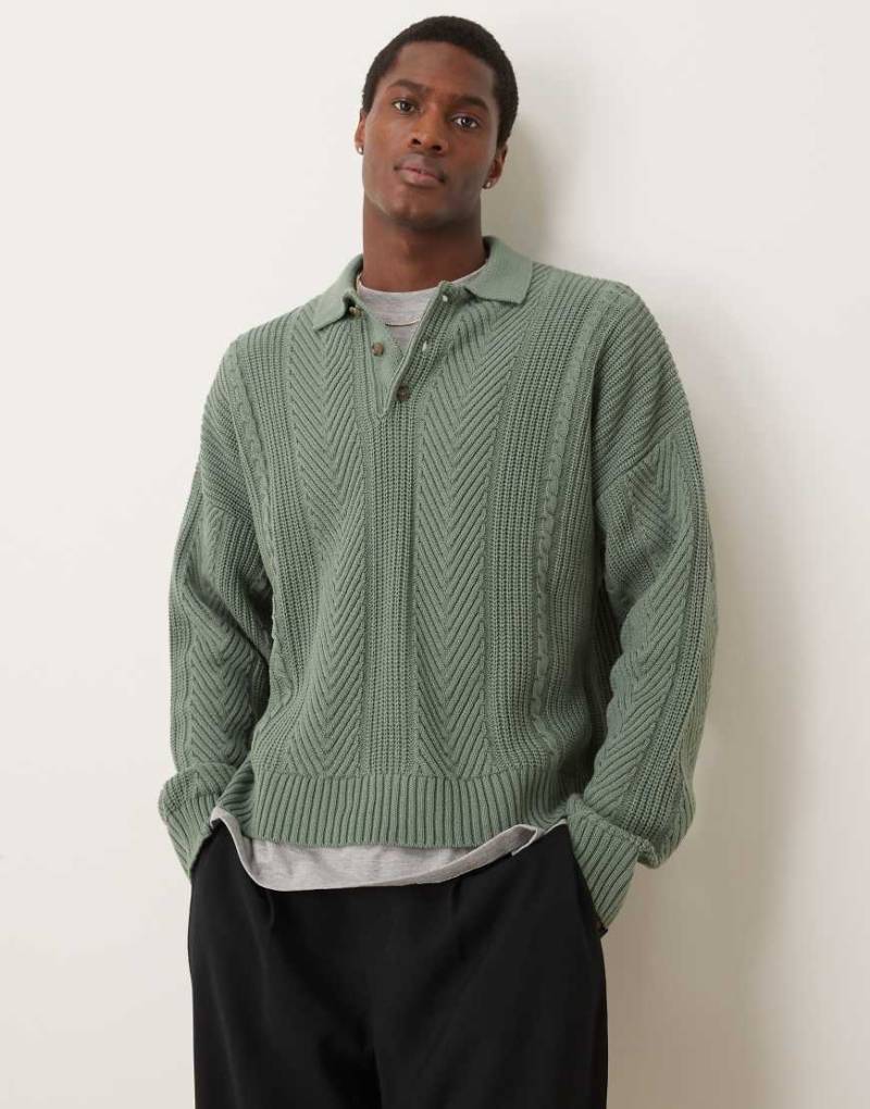 ASOS DESIGN - Kastenförmiges Oversize-Poloshirt aus Strick in Grün mit Fischgrätmuster von ASOS DESIGN
