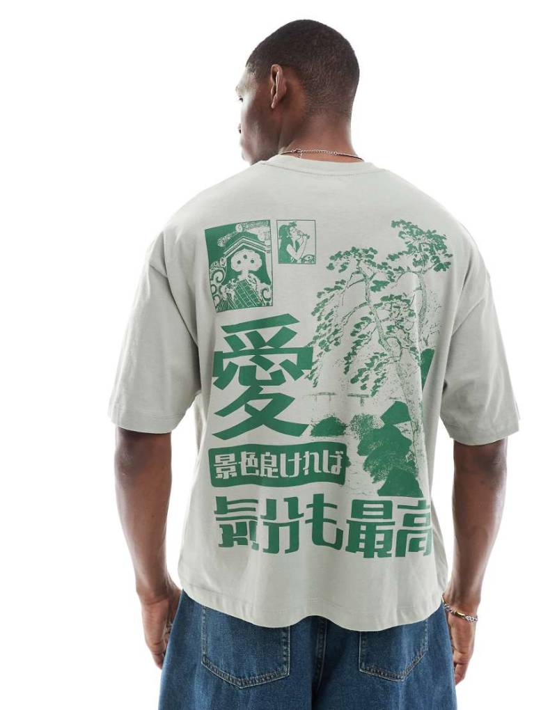 ASOS DESIGN - Kastig geschnittenes Oversize-T-Shirt in Grau mit Souvenir-Grafik von ASOS DESIGN