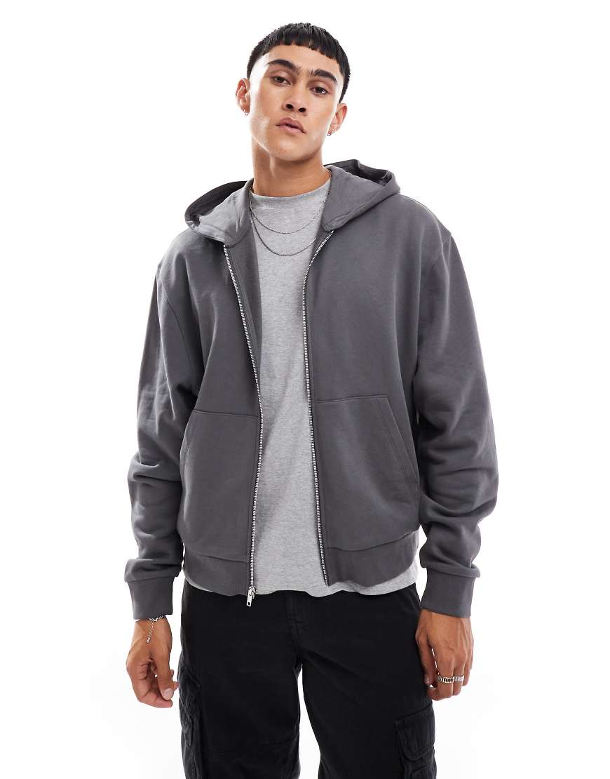 ASOS DESIGN - Kastige Basic-Kapuzenjacke in Anthrazit mit Oversize-Schnitt-Grau ASOS DESIGN - Kastige Basic-Kapuzenjacke in Anthrazit mit Oversize-Schnitt-Grau von ASOS DESIGN