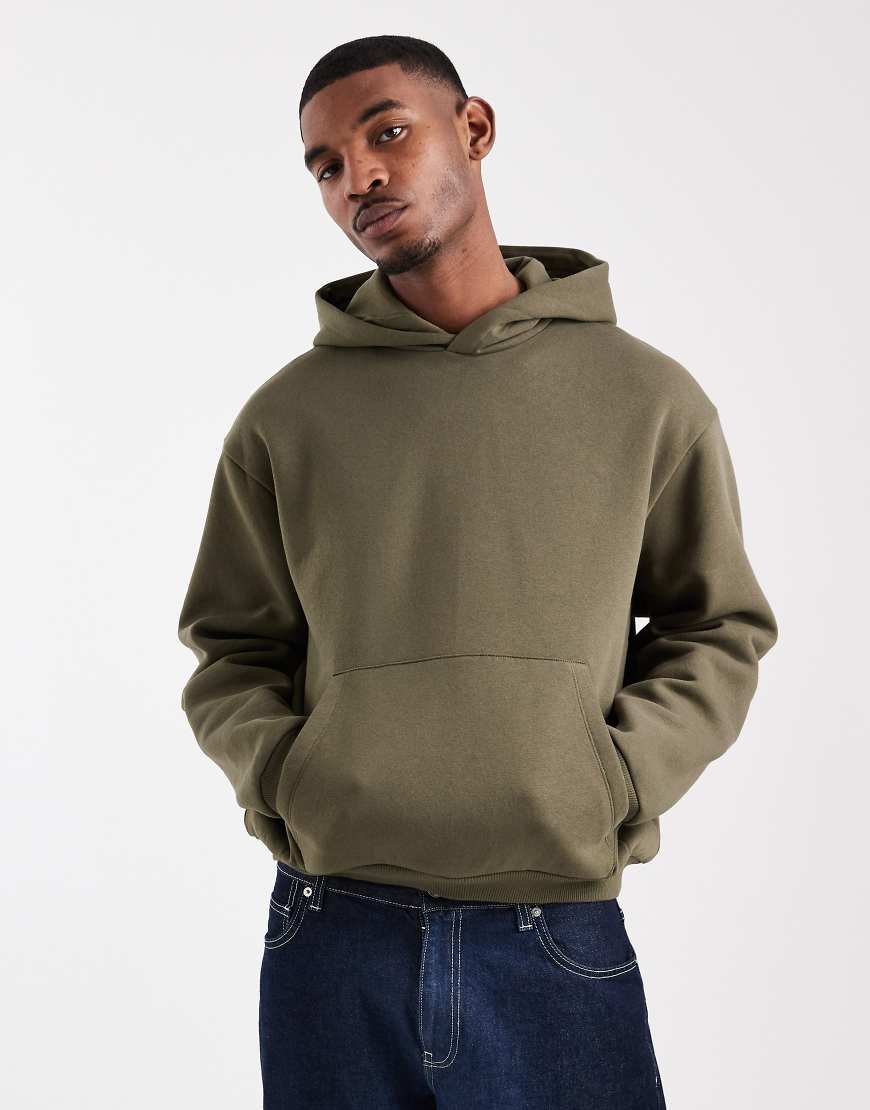ASOS DESIGN - Kastiger Basic-Kapuzenpullover in Grün mit lässigem Schnitt von ASOS DESIGN