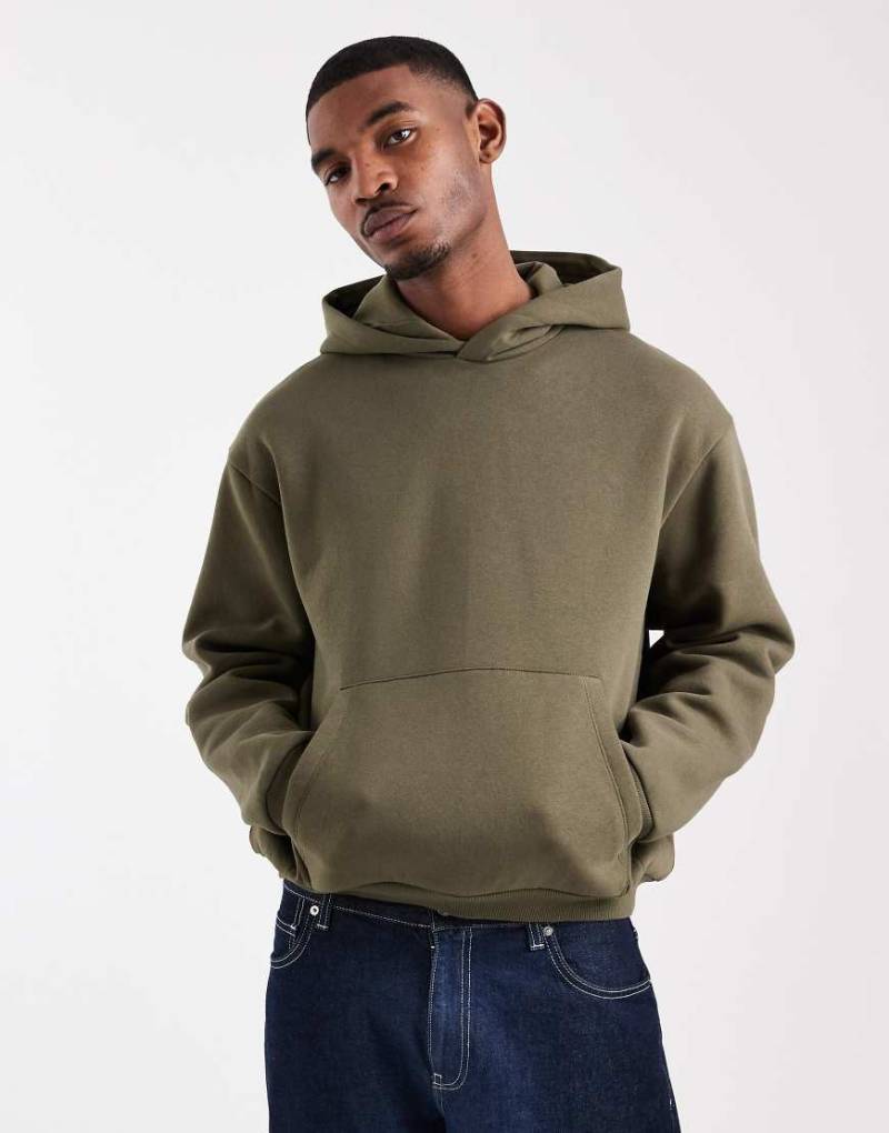 ASOS DESIGN - Kastiger Basic-Kapuzenpullover in Grün mit lässigem Schnitt von ASOS DESIGN