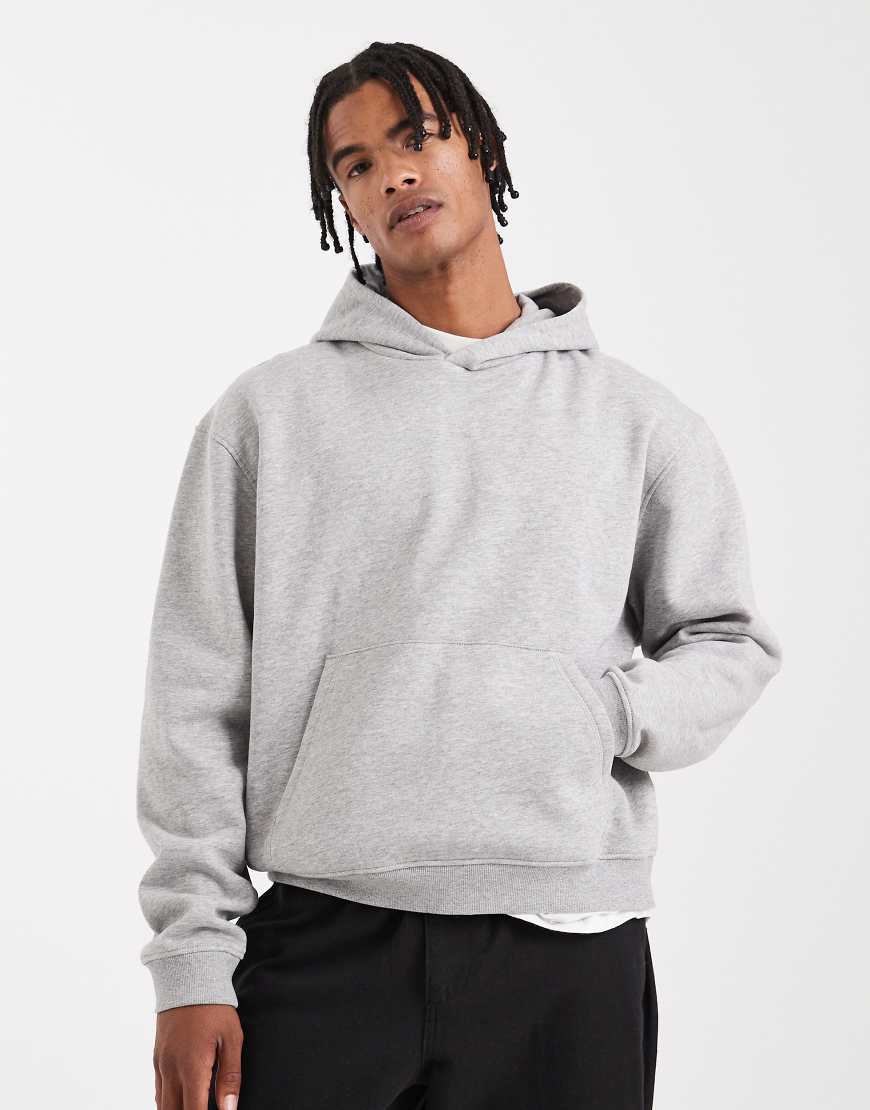 ASOS DESIGN - Kastiger Basic-Kapuzenpullover in meliertem Grau mit Relaxed Fit von ASOS DESIGN