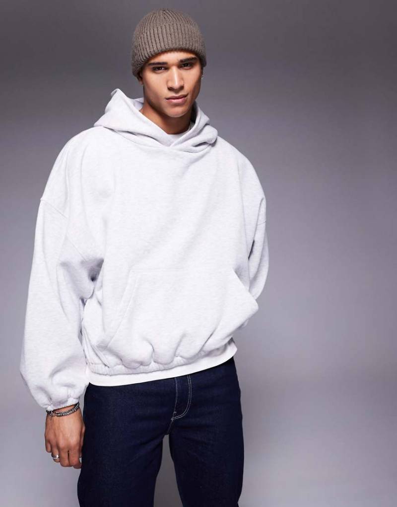 ASOS DESIGN - Kastiger Kapuzenpullover in Grau meliert mit extremer Oversize-Passform und Unterarmeinsätzen von ASOS DESIGN