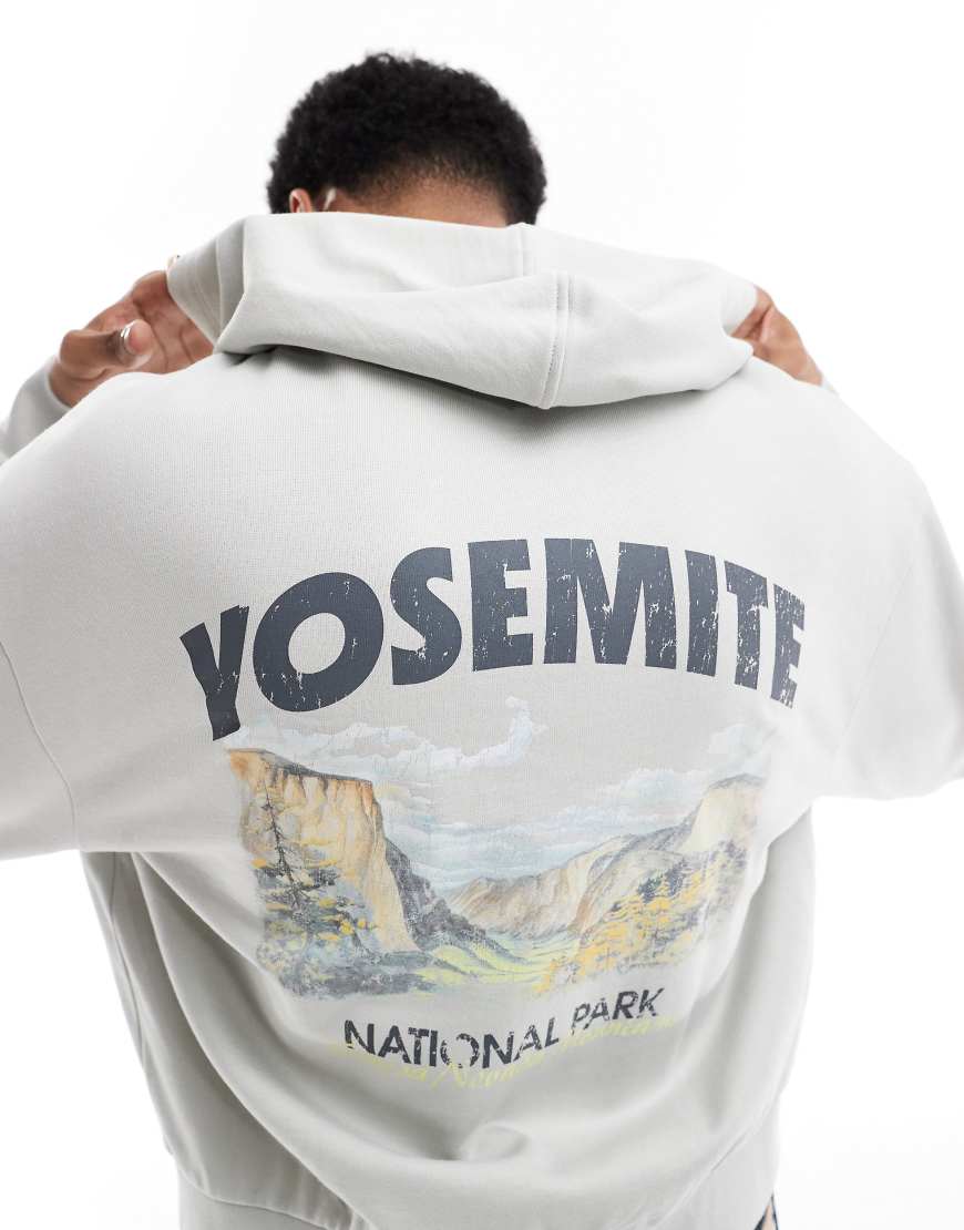 ASOS DESIGN - Kastiger Kapuzenpullover in Grau mit Rückenprint von ASOS DESIGN