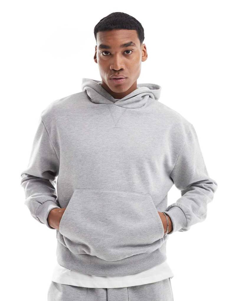 ASOS DESIGN - Kastiger Oversize-Kapuzenpullover aus 400 g/m² schwerem, hochwertigem Material in verwaschenem Grau von ASOS DESIGN