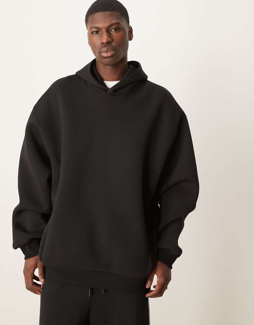 ASOS DESIGN - Kastiger Oversize-Kapuzenpullover aus schwerem Scuba-Stoff in Schwarz ASOS DESIGN - Kastiger Oversize-Kapuzenpullover aus schwerem Scuba-Stoff in Schwarz von ASOS DESIGN