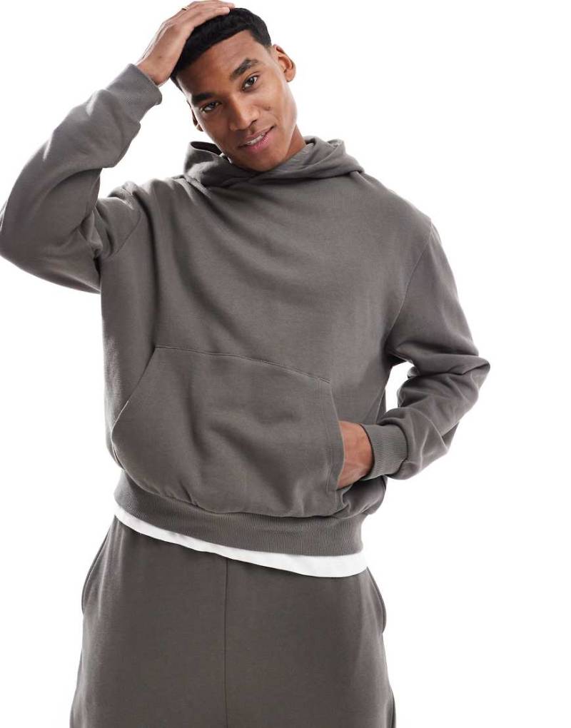 ASOS DESIGN - Kastiger Oversize-Kapuzenpullover in Dunkelgrün von ASOS DESIGN