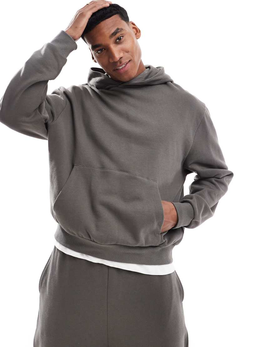 ASOS DESIGN - Kastiger Oversize-Kapuzenpullover in Dunkelgrün ASOS DESIGN - Kastiger Oversize-Kapuzenpullover in Dunkelgrün von ASOS DESIGN