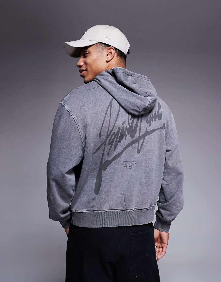 ASOS DESIGN - Kastiger Oversize-Kapuzenpullover in Grau mit Print und Acid-Waschung von ASOS DESIGN