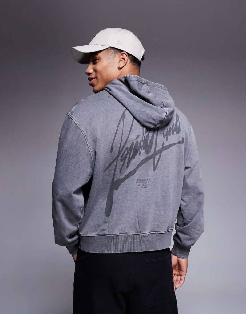 ASOS DESIGN - Kastiger Oversize-Kapuzenpullover in Grau mit Print und Acid-Waschung von ASOS DESIGN