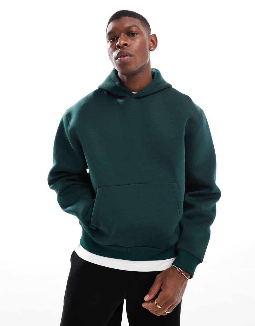 ASOS DESIGN - Kastiger Oversize-Kapuzenpullover in grüner Neopren-Optik ASOS DESIGN - Kastiger Oversize-Kapuzenpullover in grüner Neopren-Optik von ASOS DESIGN