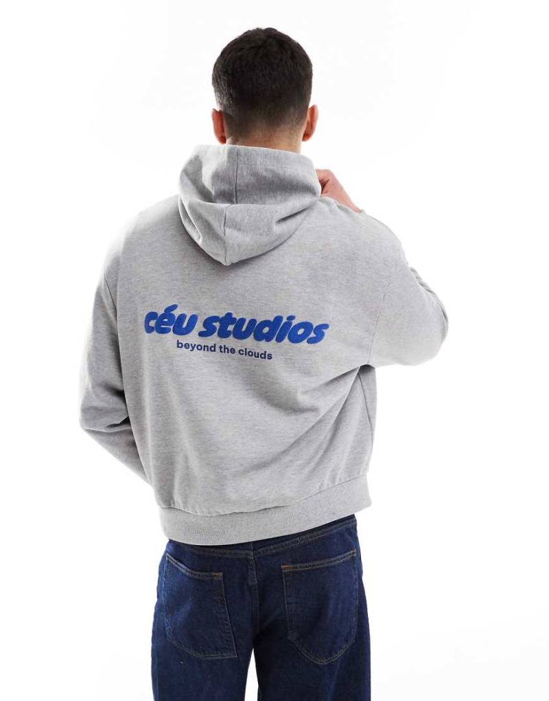 ASOS DESIGN - Kastiger Oversize-Kapuzenpullover in meliertem Grau mit Text-Prints von ASOS DESIGN