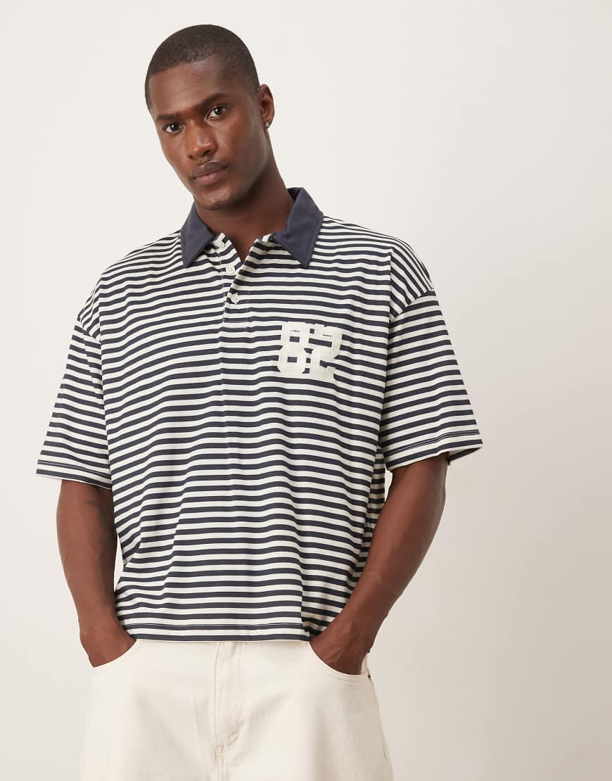 ASOS DESIGN - Kastiges, gestreiftes Oversize-Polohemd in Schwarz und Weiß-Bunt ASOS DESIGN - Kastiges, gestreiftes Oversize-Polohemd in Schwarz und Weiß-Bunt von ASOS DESIGN