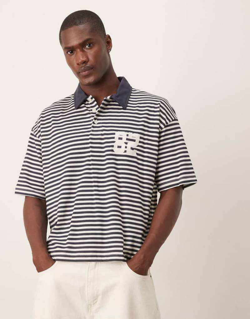 ASOS DESIGN - Kastiges, gestreiftes Oversize-Polohemd in Schwarz und Weiß-Bunt von ASOS DESIGN