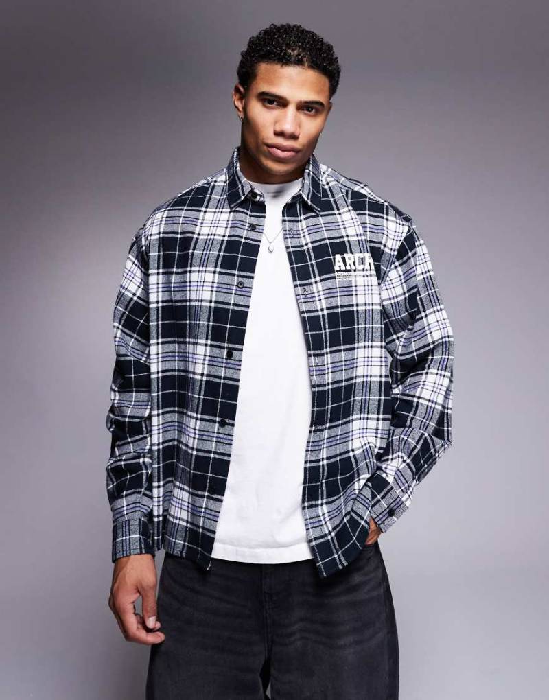 ASOS DESIGN - Kastiges, kariertes Oversize-Hemd mit Print auf Brust und Rücken-Schwarz von ASOS DESIGN